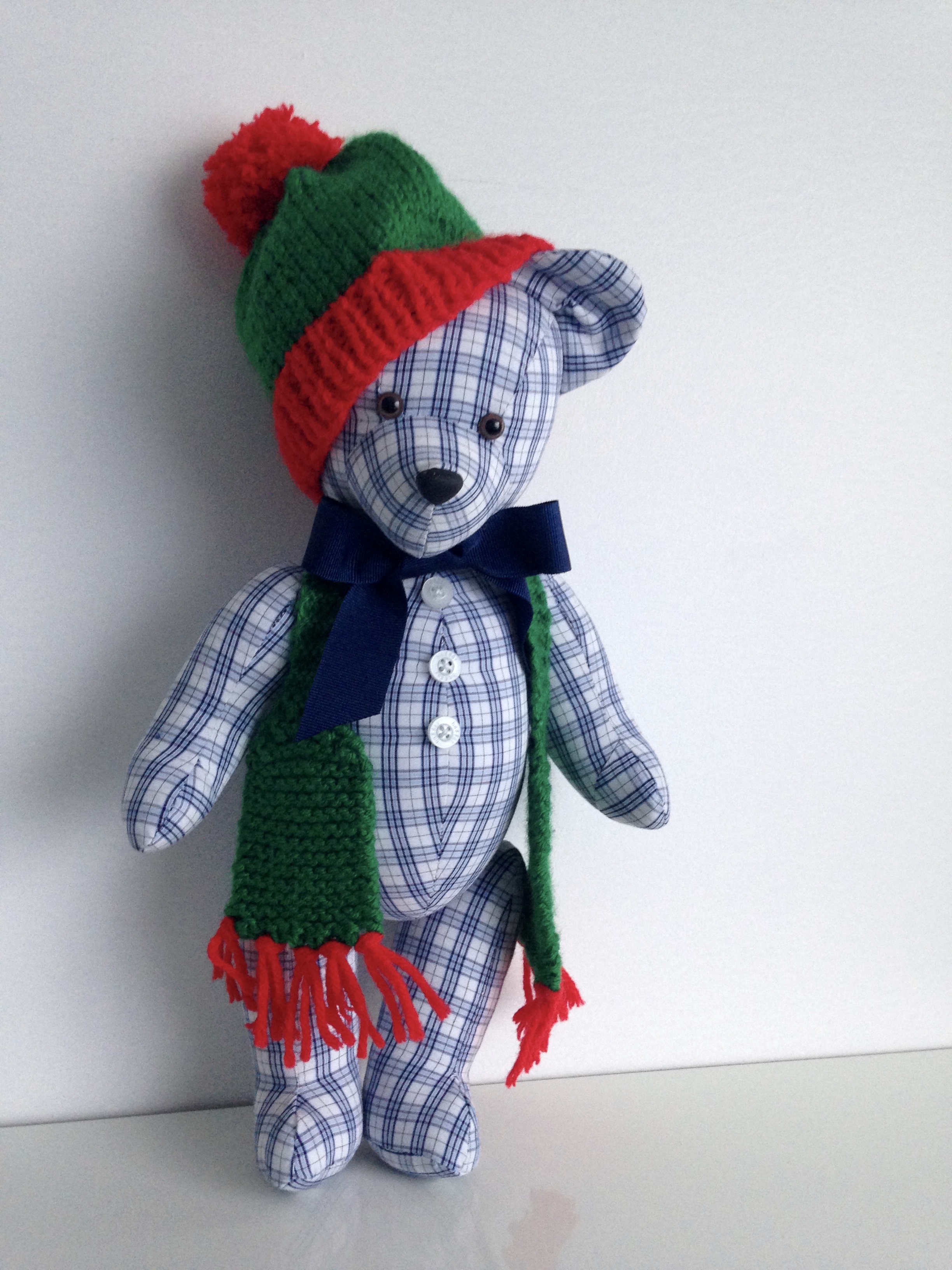 cute plaid bear dressed for winter